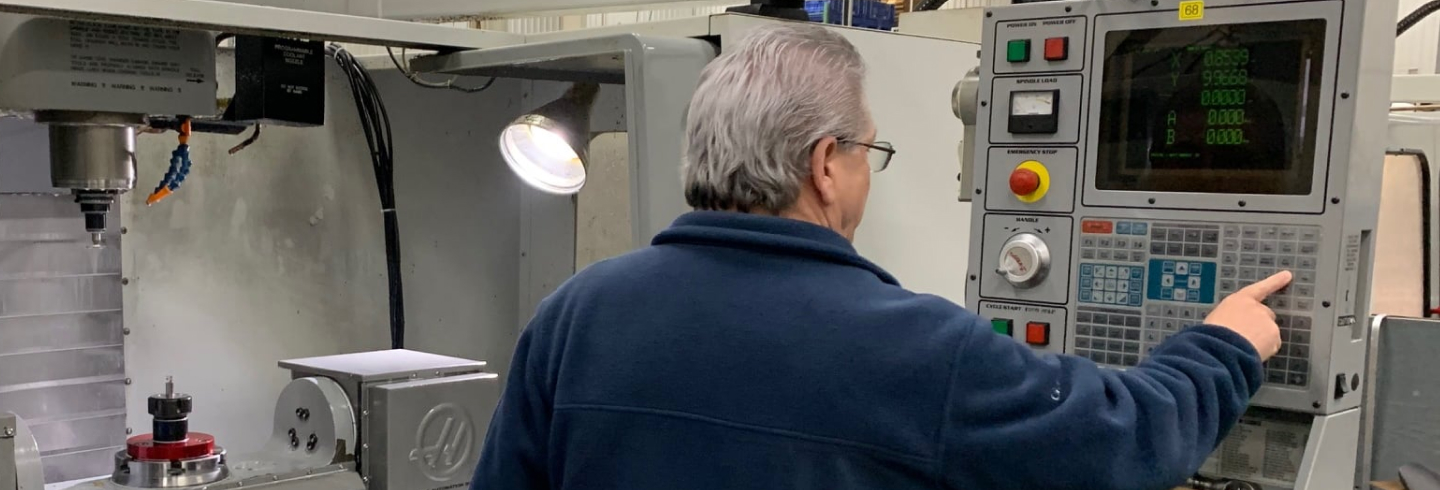 Five Star engineer working with a machine